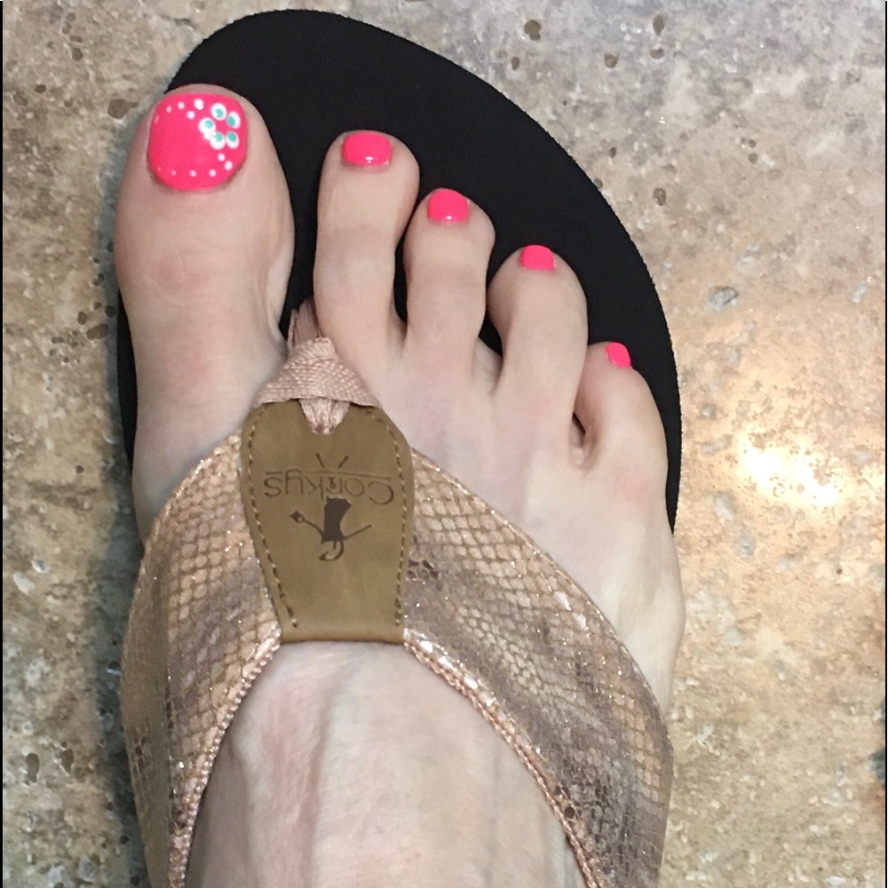 Corkys brand; metallic gold flip flops; size 9